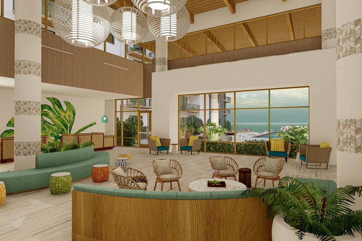 A digital rendering of a main lobby with coastal seating decor, and a window overlooking an outdoor pool and beachfront.
