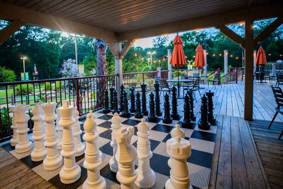 An oversized chess set near our Activities Outpost at our Villages Resort located in Flint, Texas.