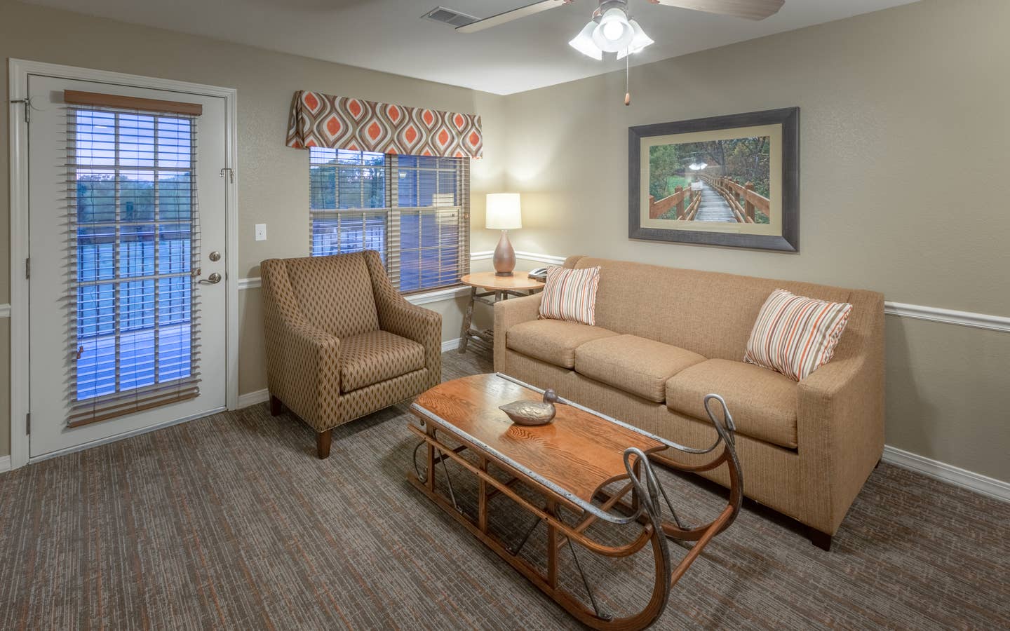 Living room in a two-bedroom villa at Holiday Hills Resort in Branson, MO.