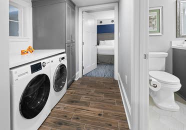 Washer and dryer in a four-bedroom Signature Collection villa at Cape Canaveral Resort.