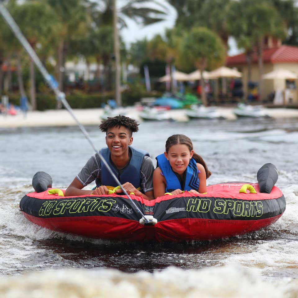 Two children tubing at Orange Lake Resort near Orlando, Florida.