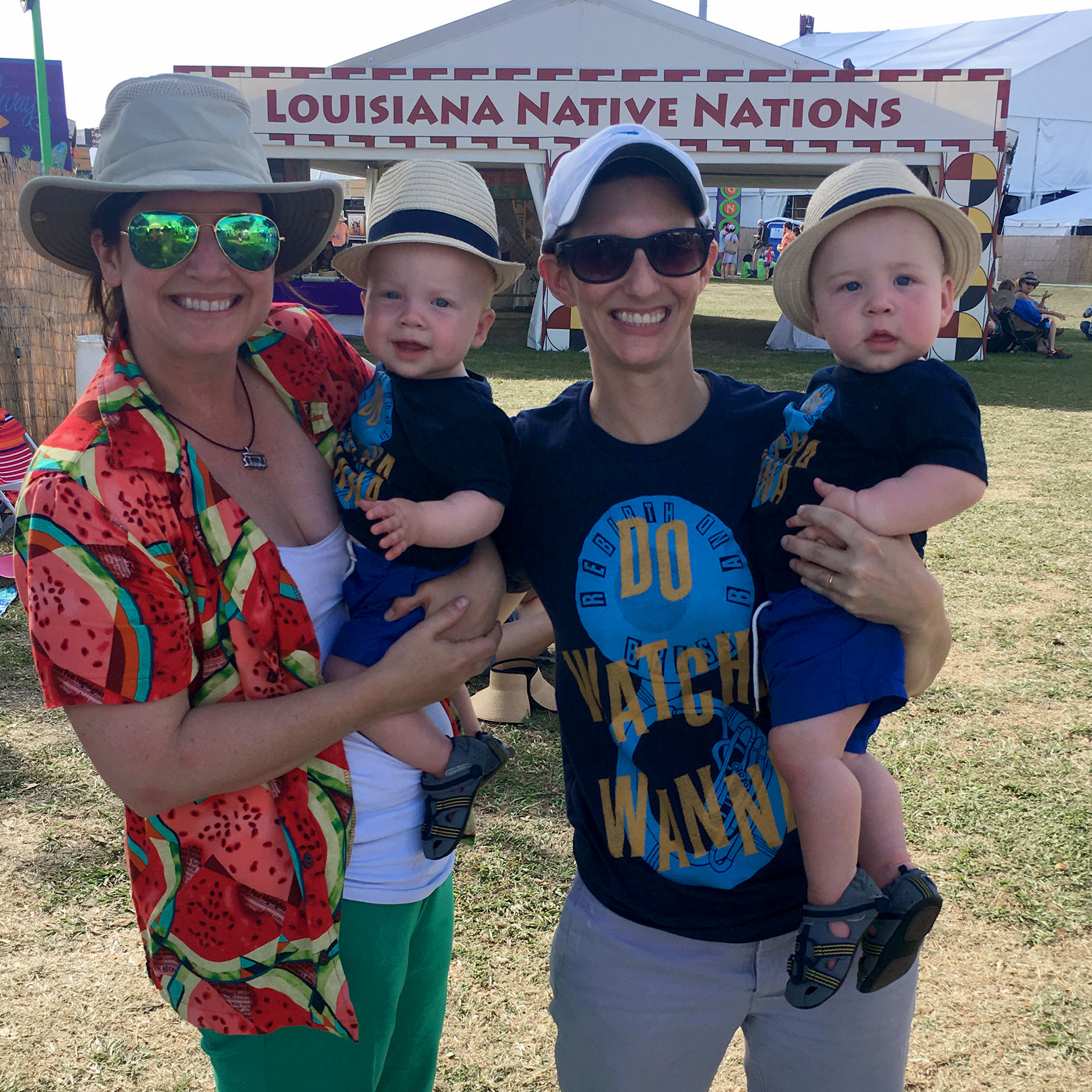Featured Contributor, Catherine Karas (left), and her family stand outdoors.