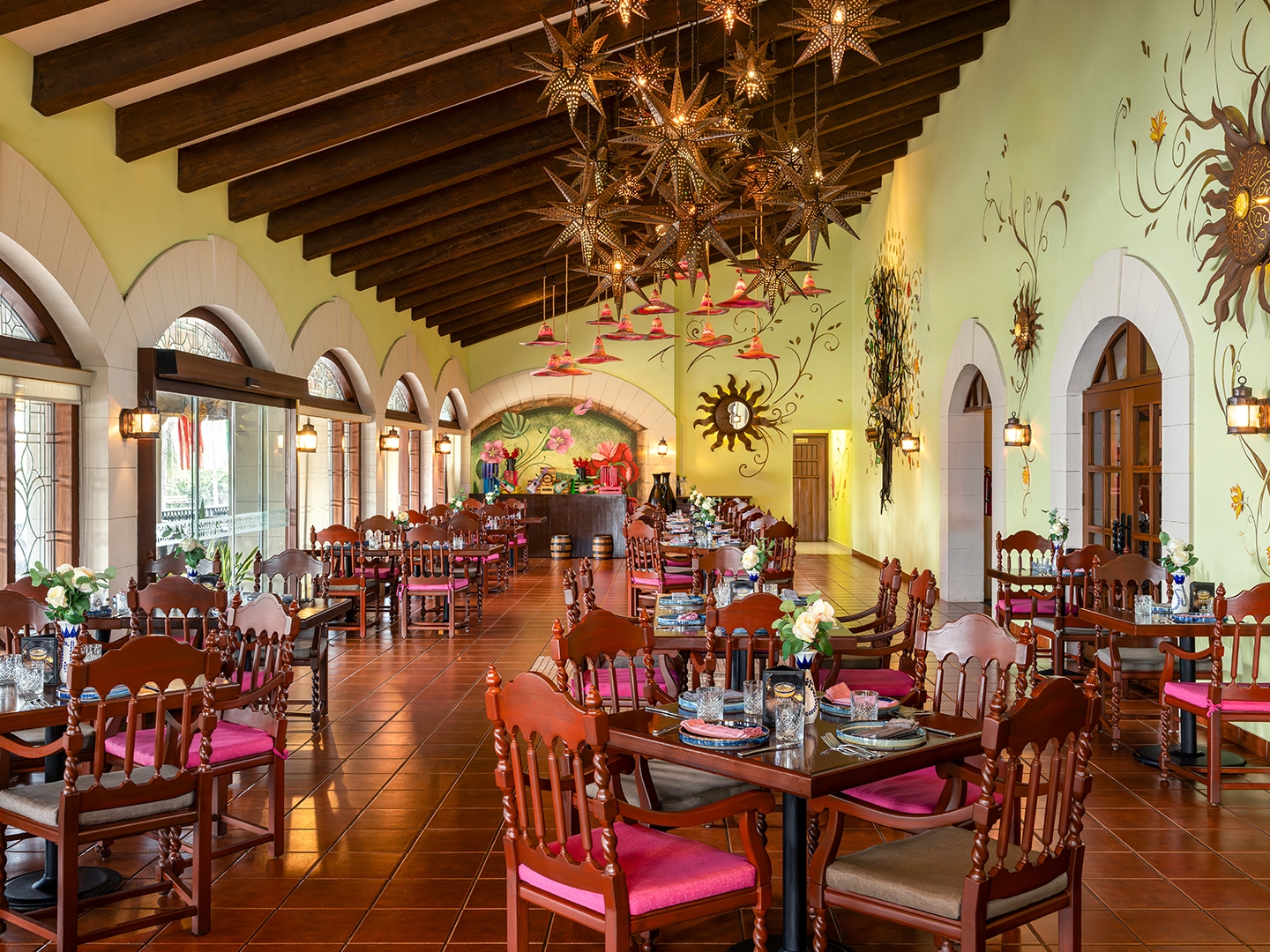 Classic Mexican elegance defines the Hacienda Sisal dining room.