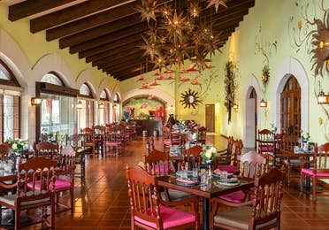 Classic Mexican elegance defines the Hacienda Sisal dining room.