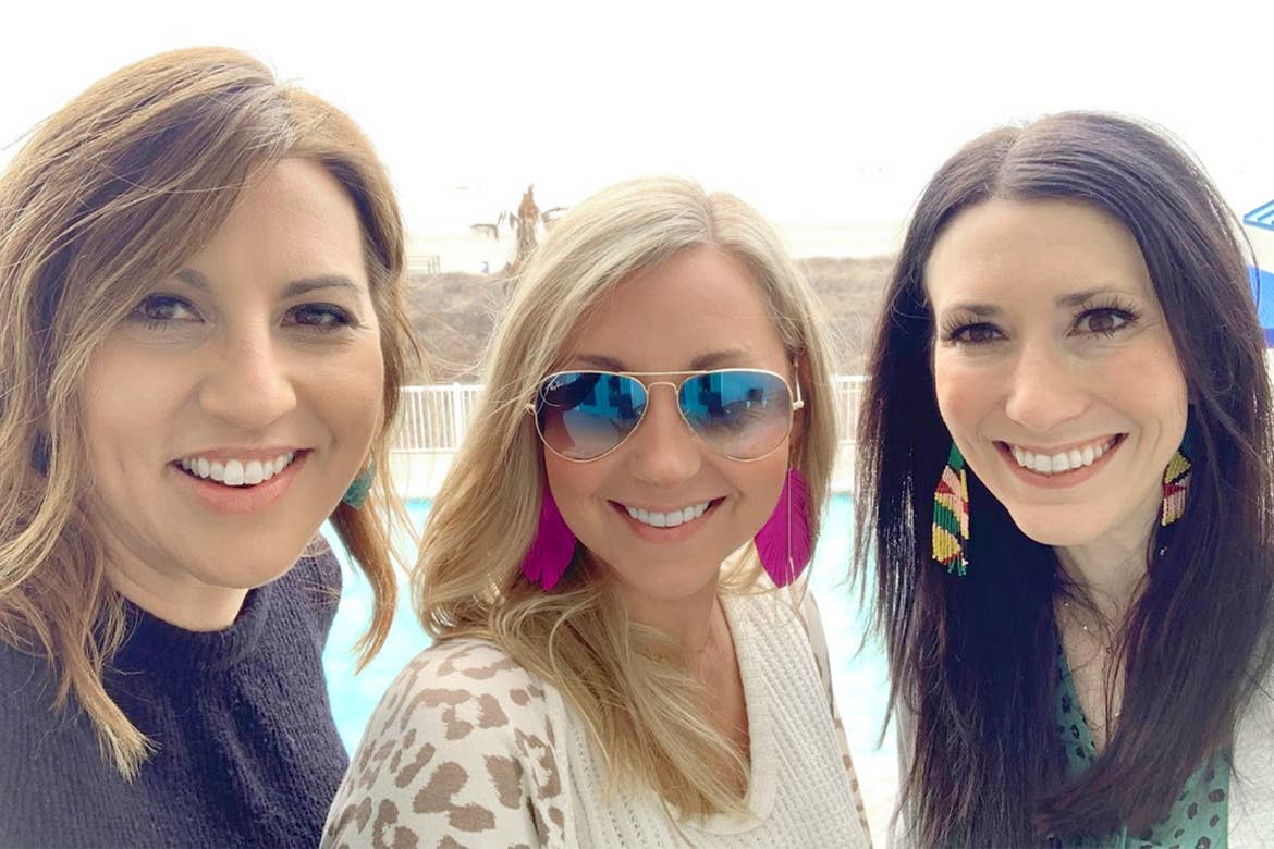 Featured Contributor, Amanda Nall (middle) poses with her two friends on the beach near our Galveston Beach Resort in Galveston, Tx.