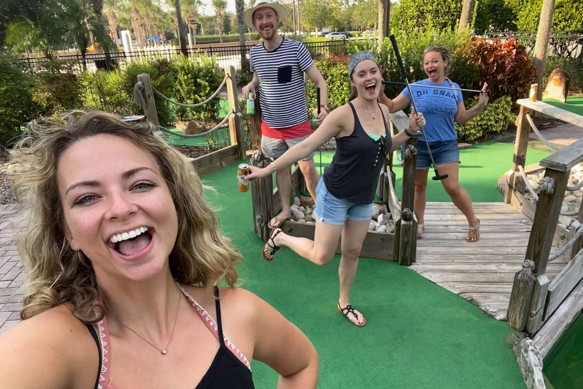Featured Contributor, Angie Orth (left), and her sister and two friends (right) pose on the mini golf course at our Orange Lake resort in Orlando, Florida.