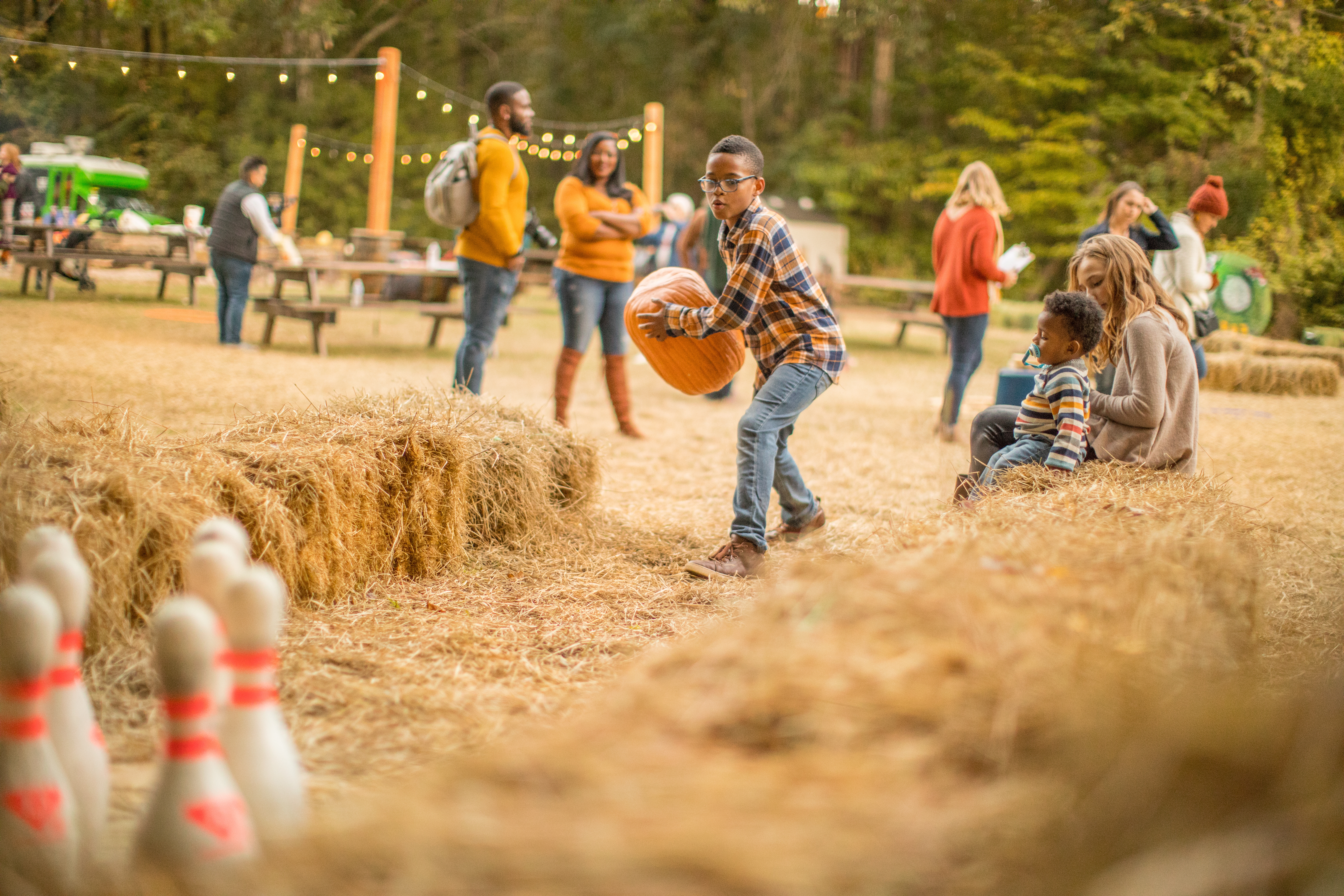 Tina's son playing pumpkin boo-ling, or bowling, at Falladays at Villages Resort