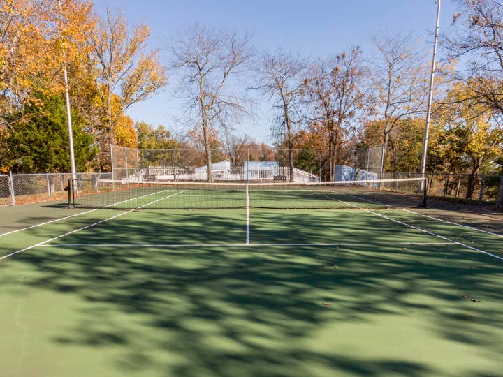 Outdoor tennis court at Ozark Mountain Resort in Kimberling City, MO.