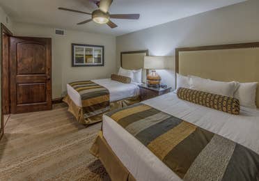 Bedroom with two double beds in the Signature Villa at the Scottsdale Resort in Arizona