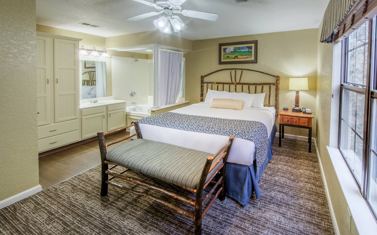 Master bedroom in a two bedroom villa at Oak n' Spruce Resort in South Lee, Massachusetts