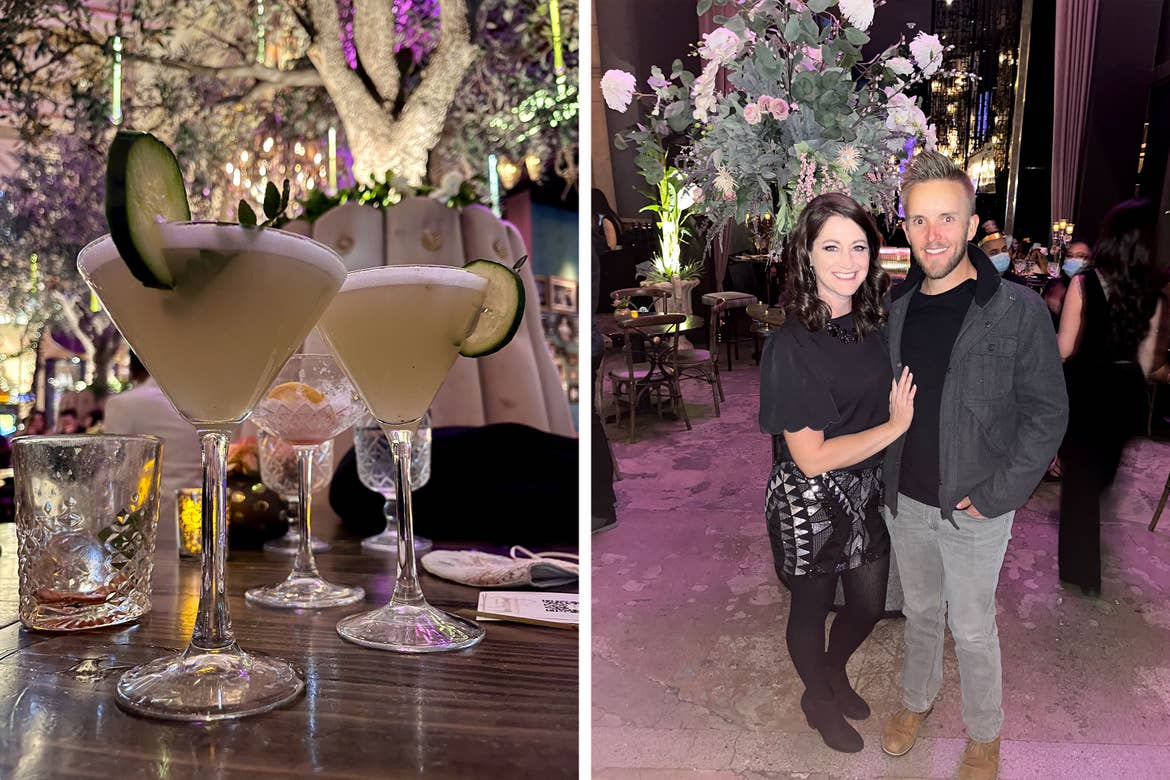 Left: Two handcrafted cocktails in martini glasses placed on a table surrounded by a faux tree and its foliage. Right: A woman dressed in black stands next to a man in grey jeans, and black-grey jacket and t-shirt stand in a restaurant with foliage.