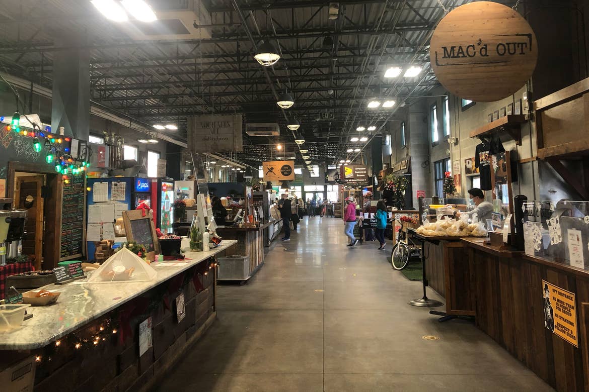 Interior of Plant Street Market with various vendors.