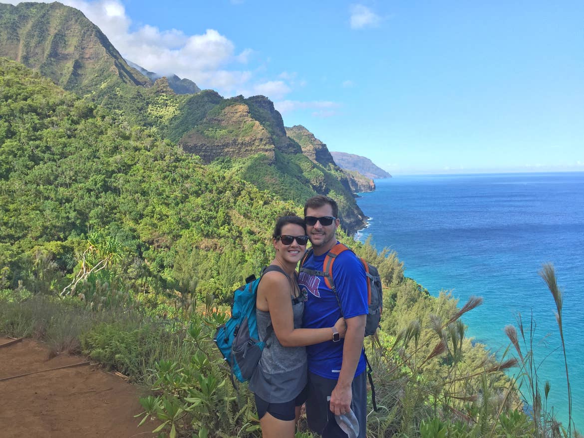 Jennifer and Anthony Harmon stand in front of the Ne-Pali in Hawaii
