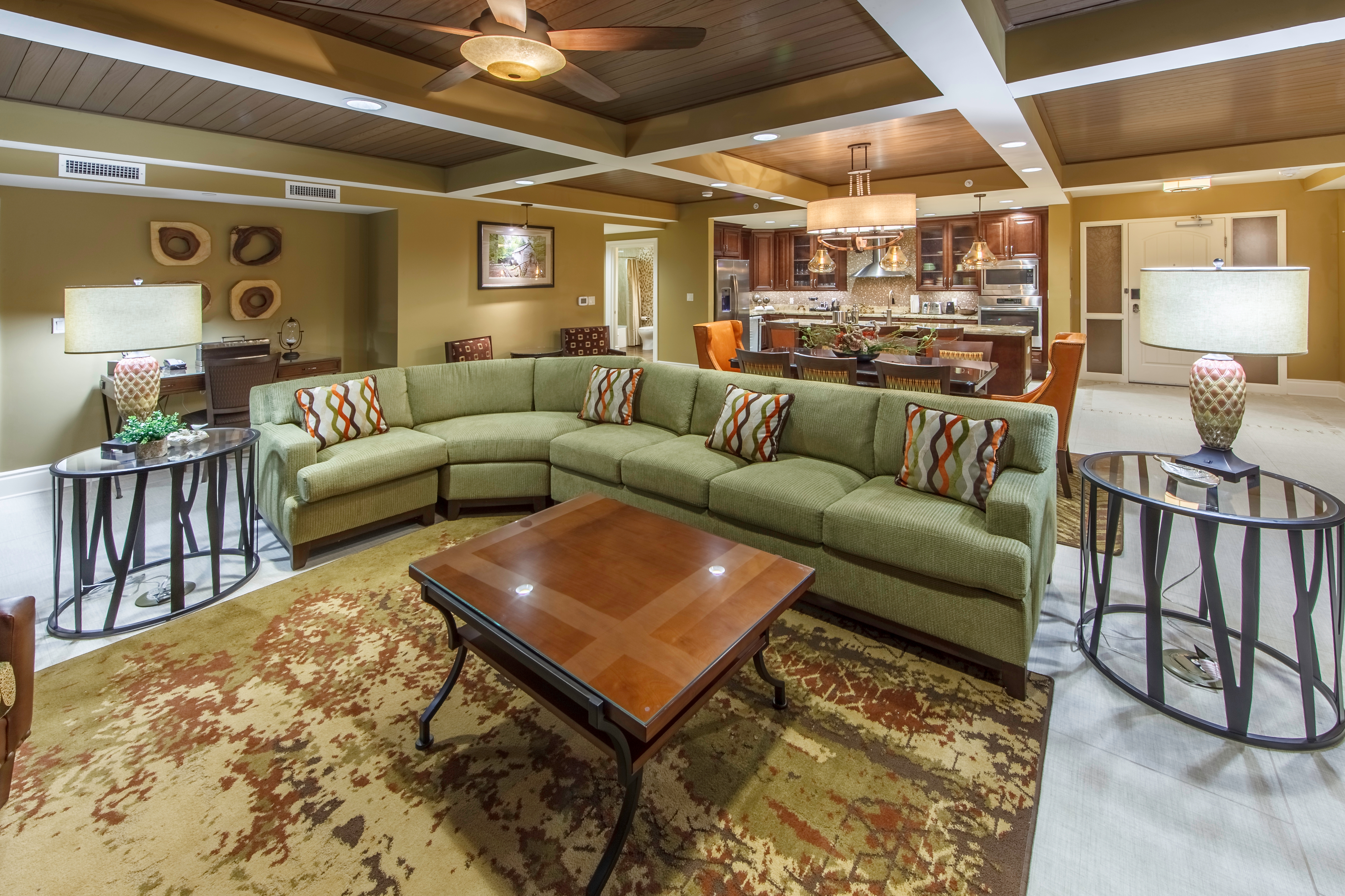Living room with sectional couch in a Signature Collection villa at Smoky Mountain Resort in Gatlinburg, Tennessee.