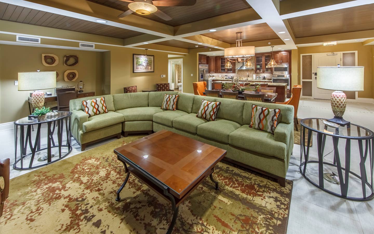 Living room with sectional couch in a Signature Collection villa at Smoky Mountain Resort in Gatlinburg, Tennessee.