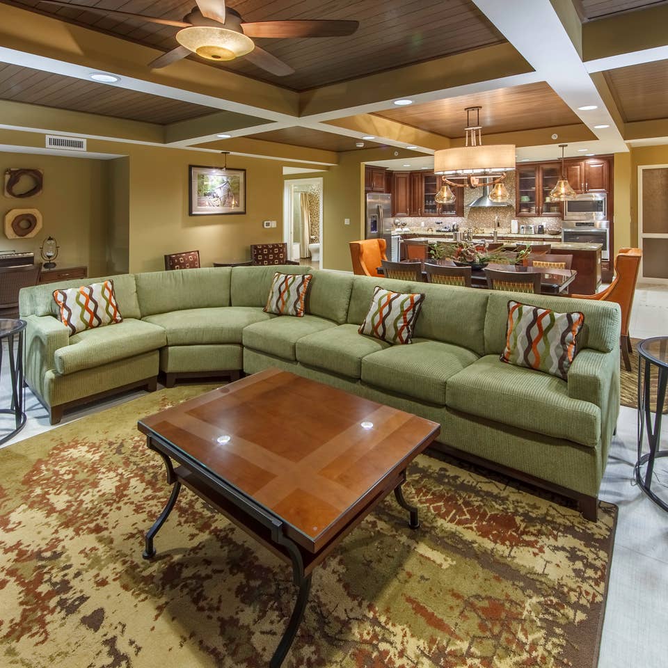 Living room with sectional couch in a Signature Collection villa at Smoky Mountain Resort in Gatlinburg, Tennessee.