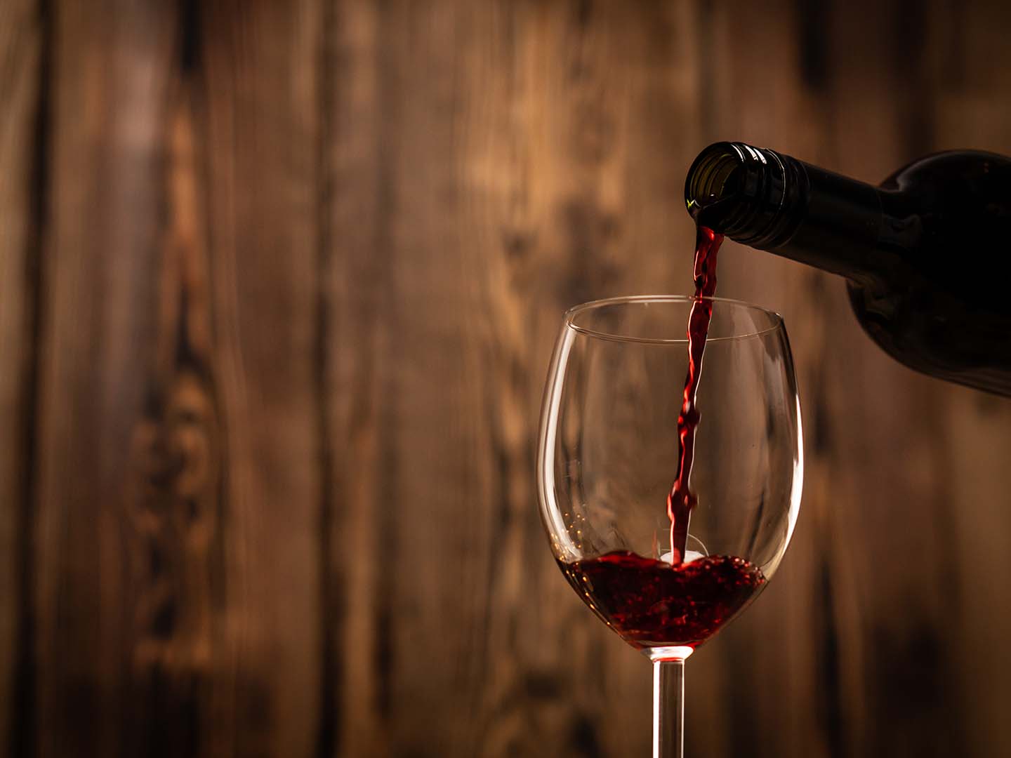 Pouring wine at the Panama City Beach Winery near Panama City Beach Resort, FL.