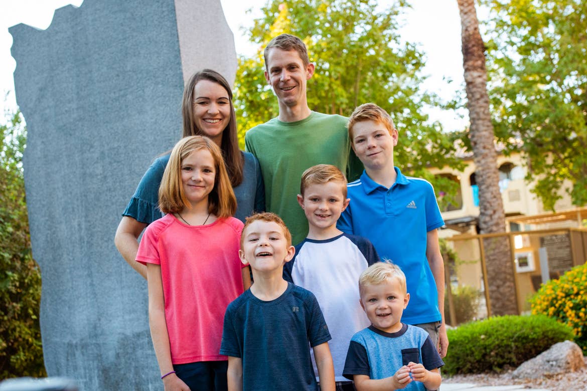 Author Jessica Averett and her family stand outside of our Scottsdale Resort.