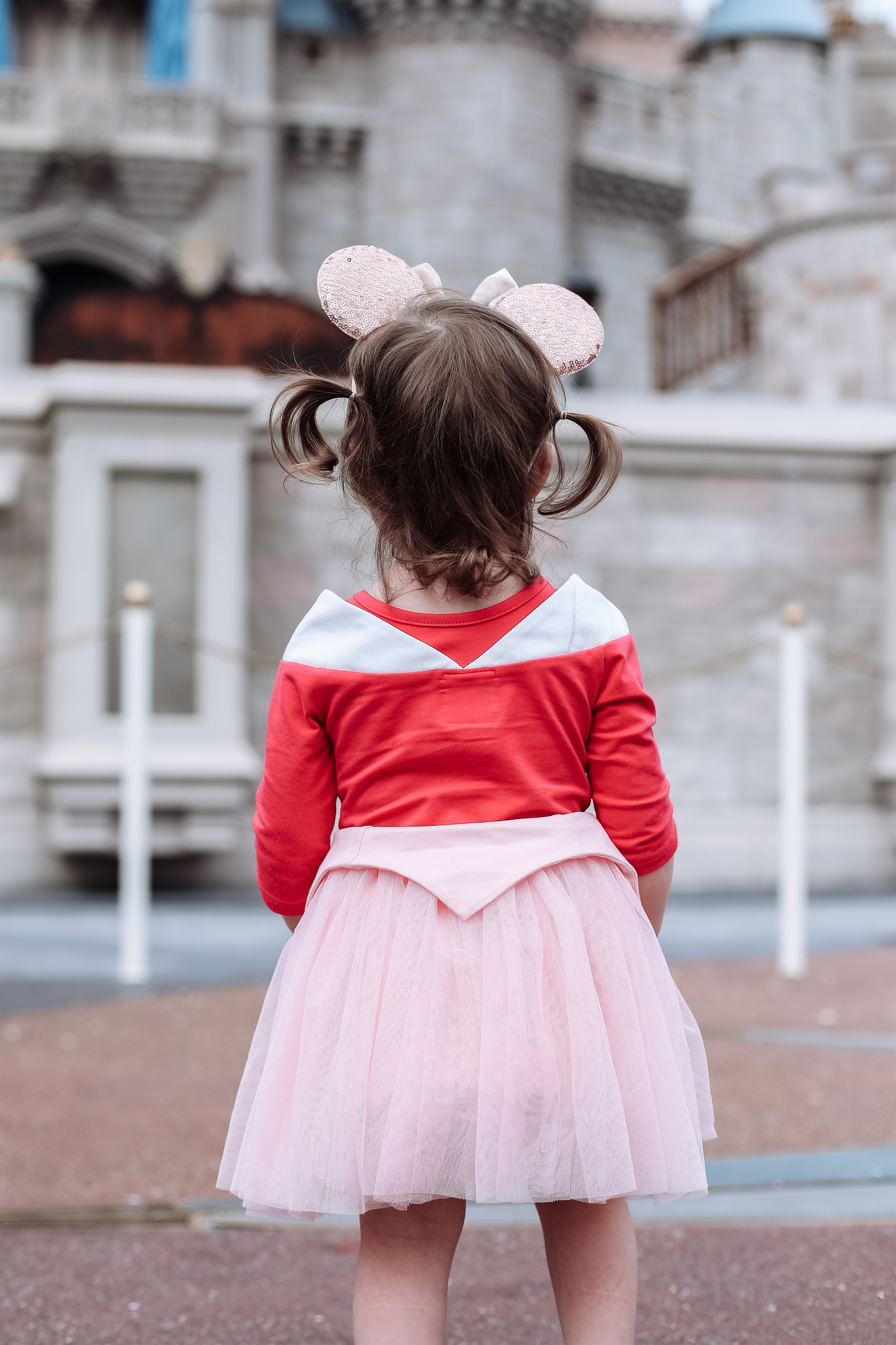 Mia's daughter looking at Cinderella Castle