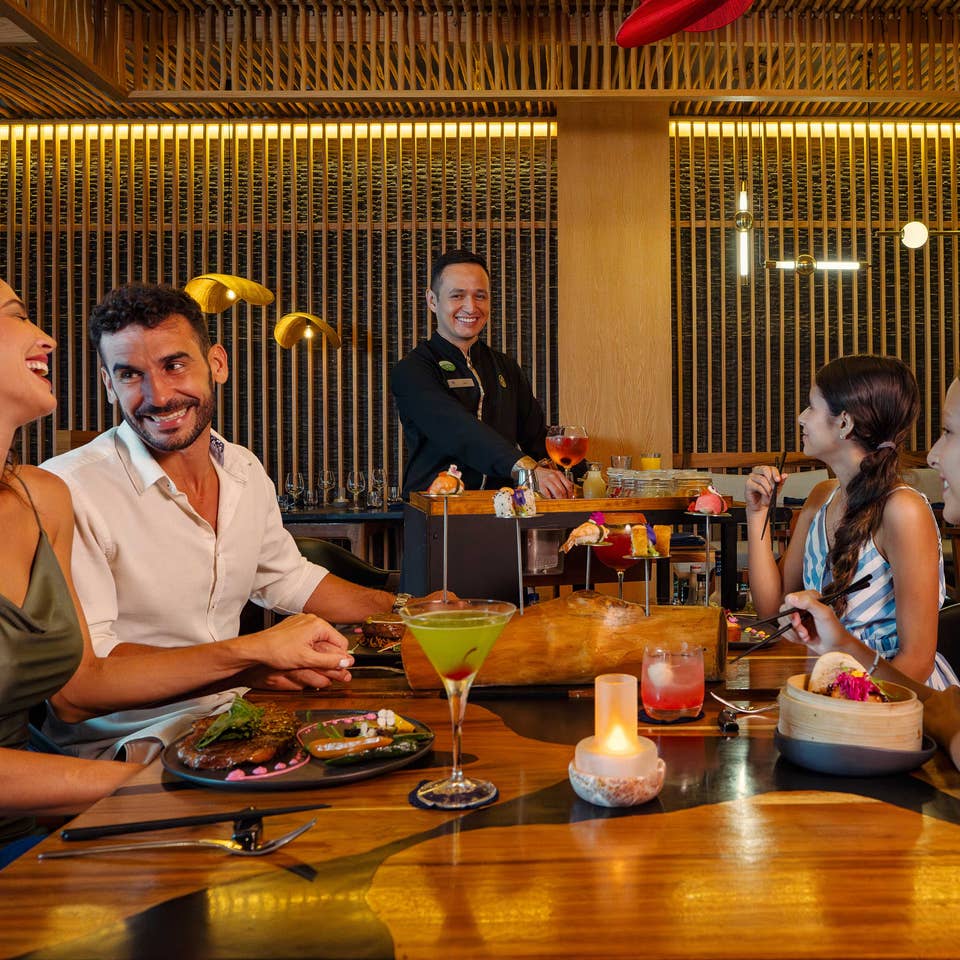 Family of four enjoy all-inclusive dining at The Royal Haciendas.