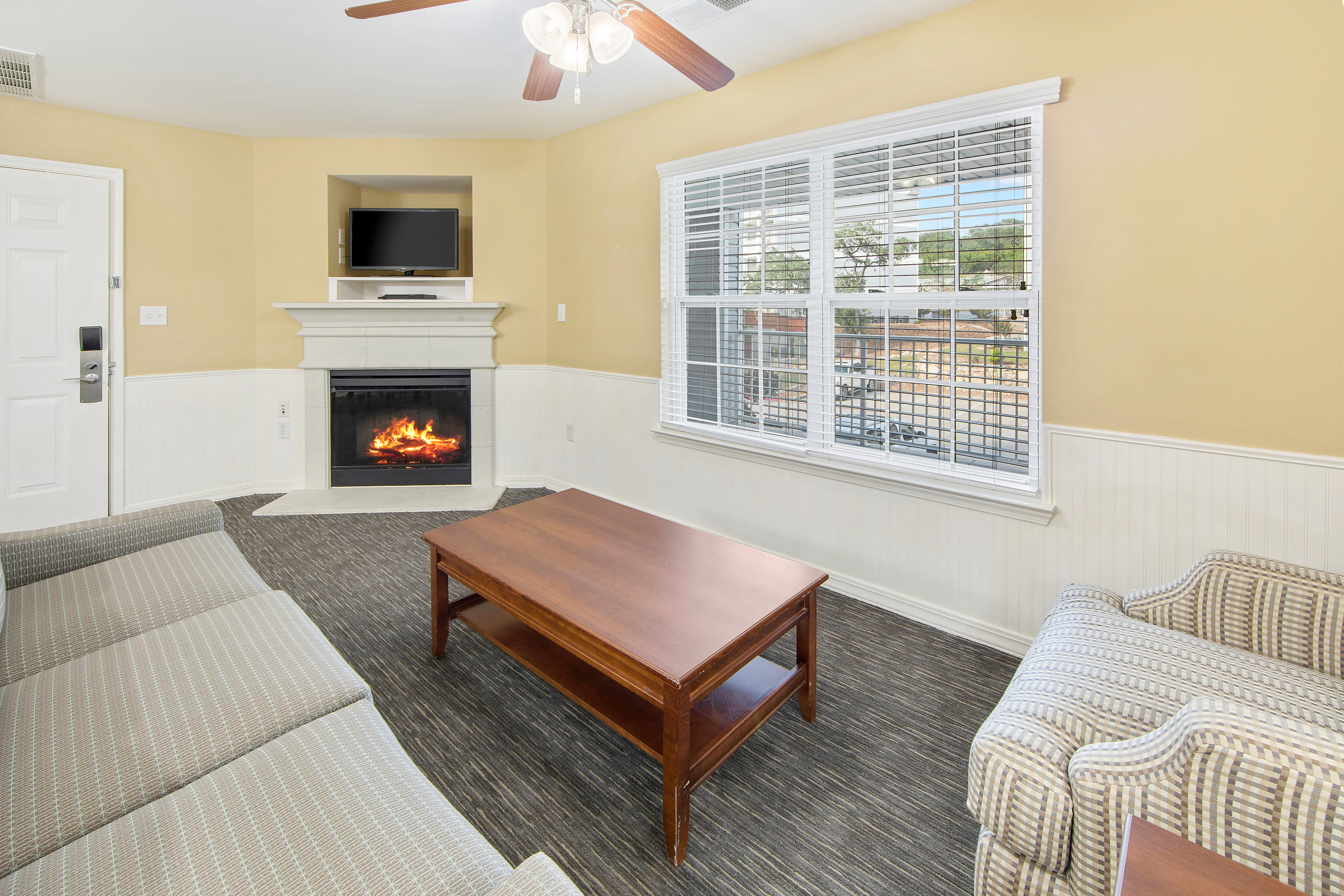 Living room area in a three-bedroom ambassador villa at the Hill Country Resort in Canyon Lake, Texas.