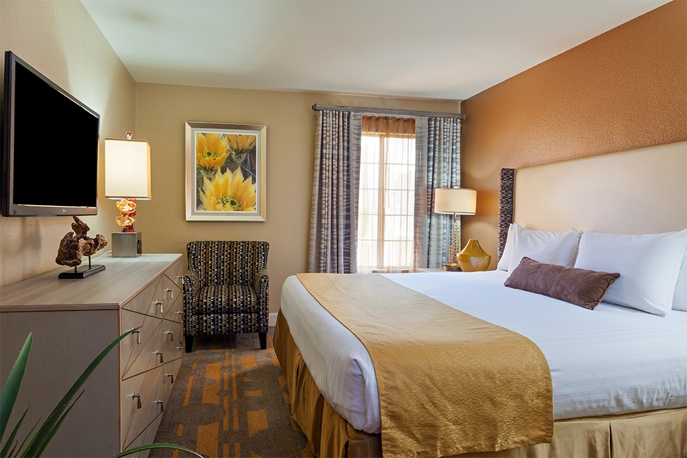 Bedroom in a one-bedroom villa at Desert Club Resort in Las Vegas