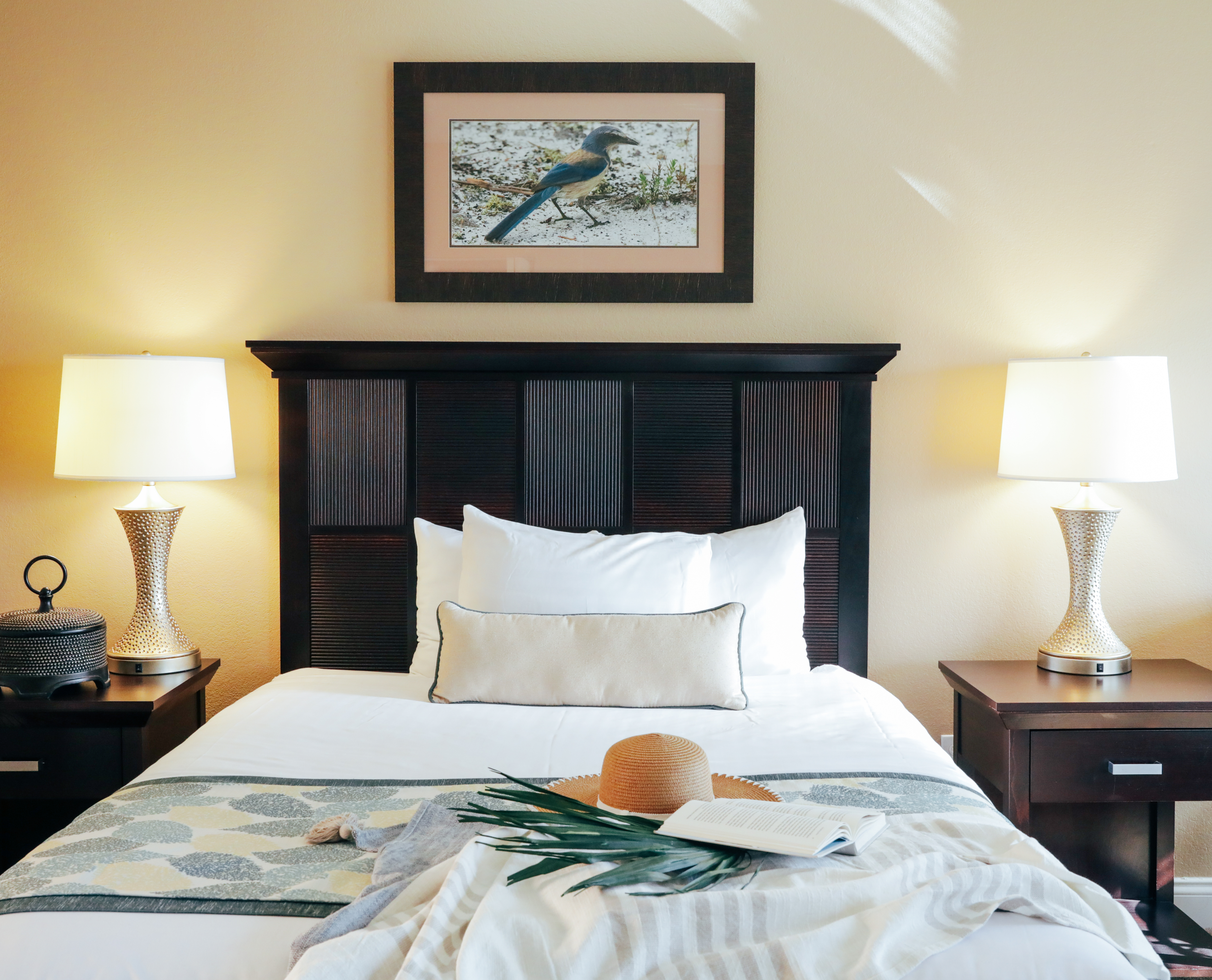 Bed with two nightstand in a three bedroom villa in West Village at Orange Lake Resort near Orlando, FL