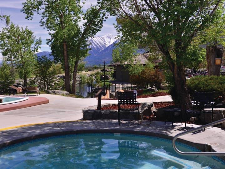 Outdoor pool with view of Sierra Nevada Mountains at David Walley's Resort in Genoa, Nevada.