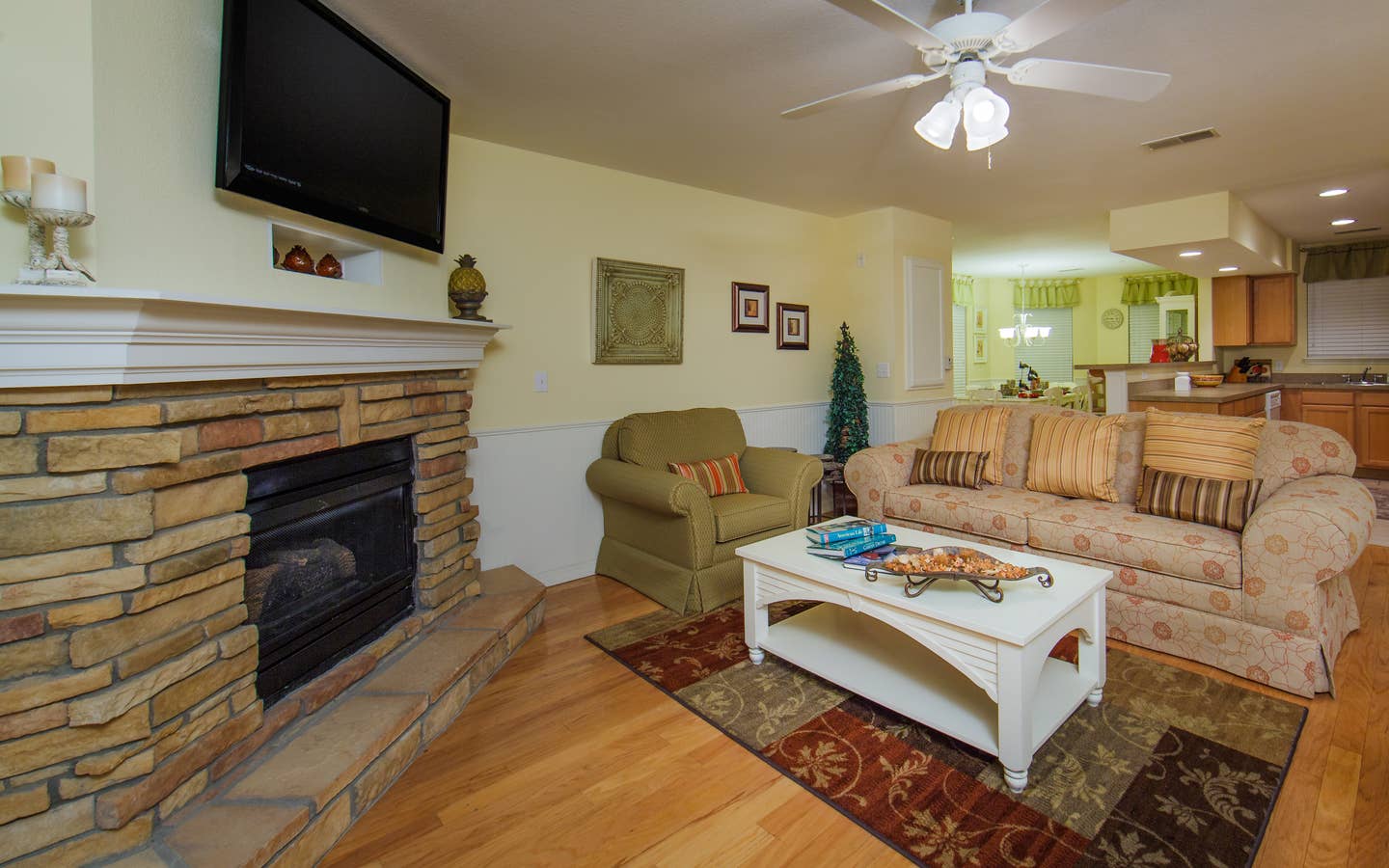 Living room with fireplace in a two-bedroom presidential villa at the Holiday Hills Resort in Branson Missouri.