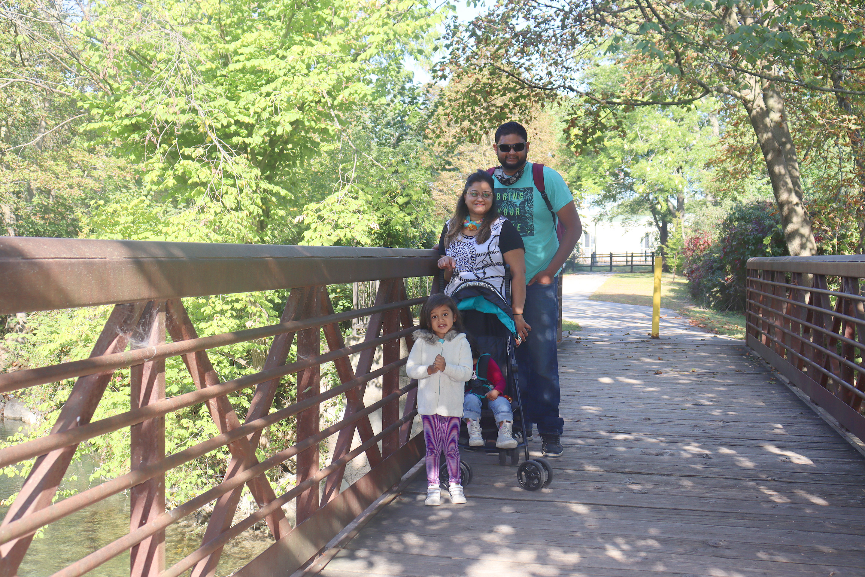 Featured Contributor, Karishma Kittur (top-left), her husband, Rohan (top-right) and two daughters, Myrra (front-left) and Amarra (front-right).
