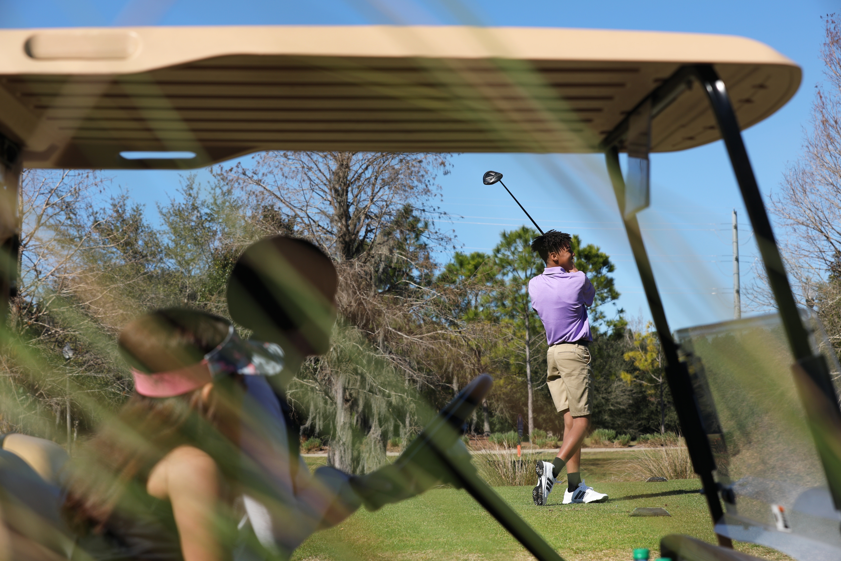 Clarissa's son golfing