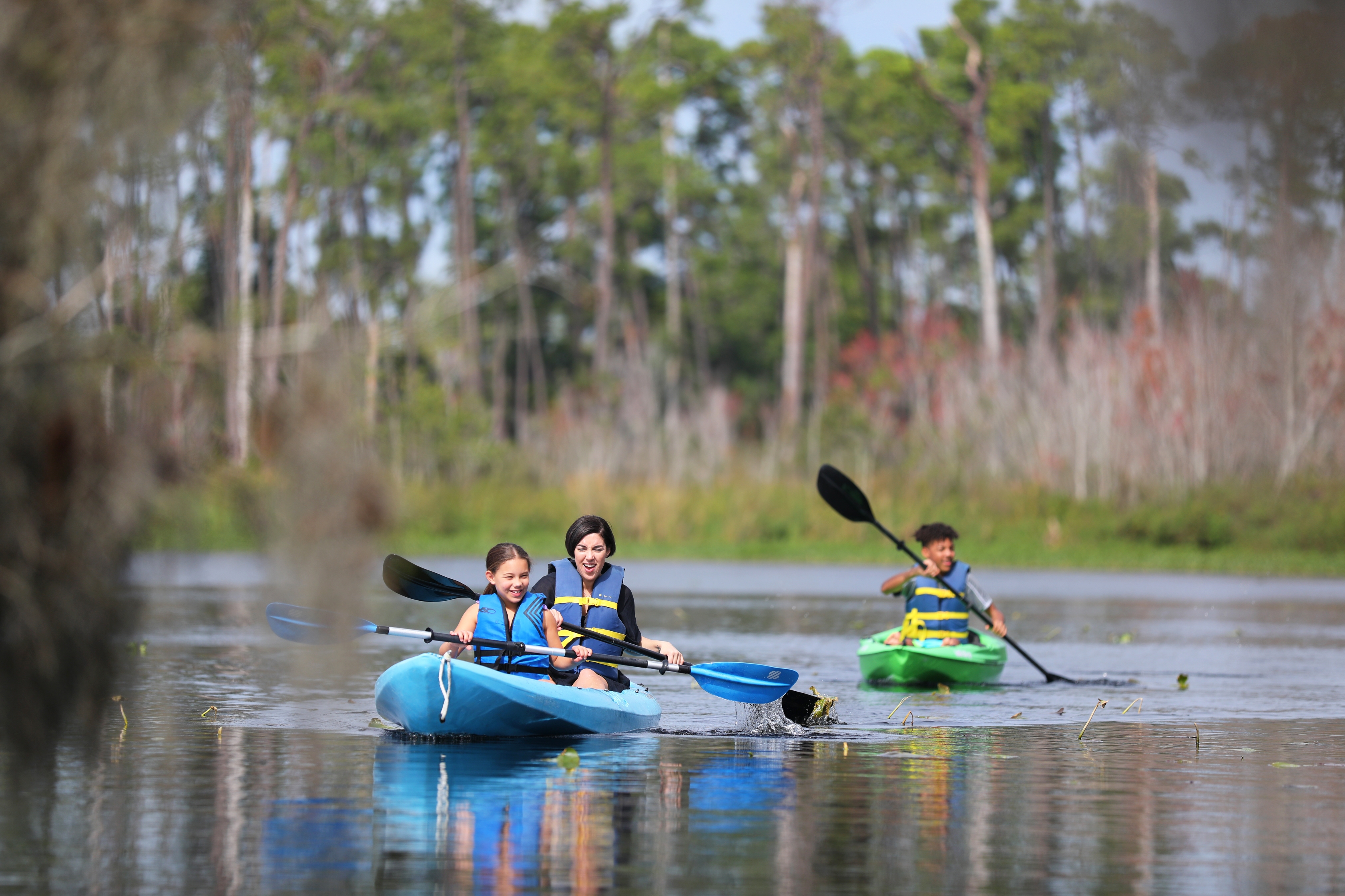 Clarissa kayaking with her kids