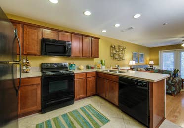 Kitchen view in a three-bedroom ambassador villa at the Holiday Hills Resort in Branson Missouri.