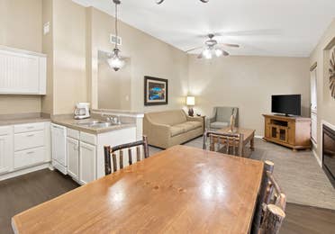 Dining room and living area in two-bedroom cabin at the Hill Country Resort in Canyon Lake, Texas.