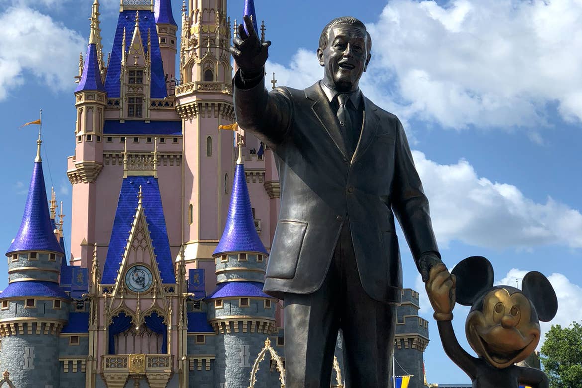 The 'Partners Statue' in front of Cinderella's Castle at Magic Kingdom at Walt Disney World Resort.