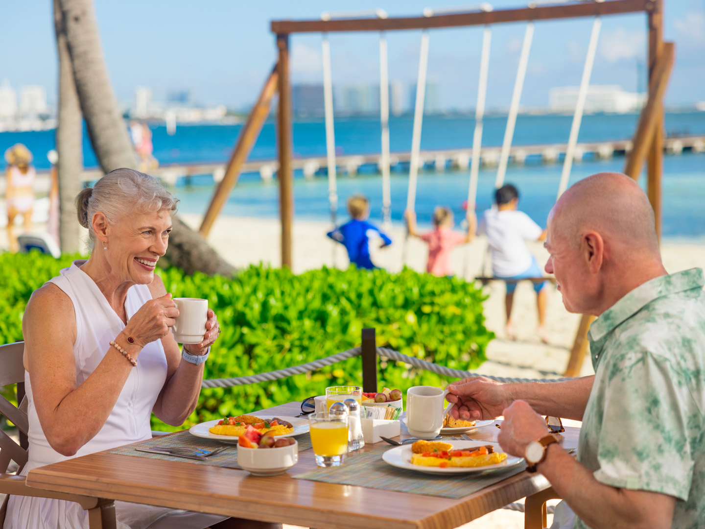 Couple eating outdoors.