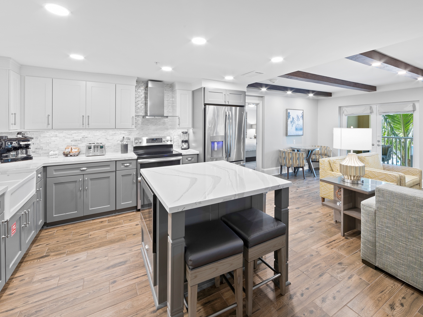 Kitchen with stainless steel appliances in a four-bedroom Signature Collection villa at Cape Canaveral Resort.