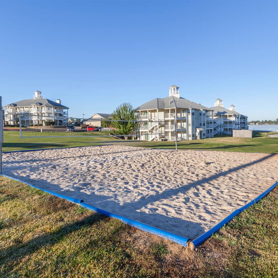 Outdoor sand volleyball at Piney Shores Resort in Conroe, Texas.
