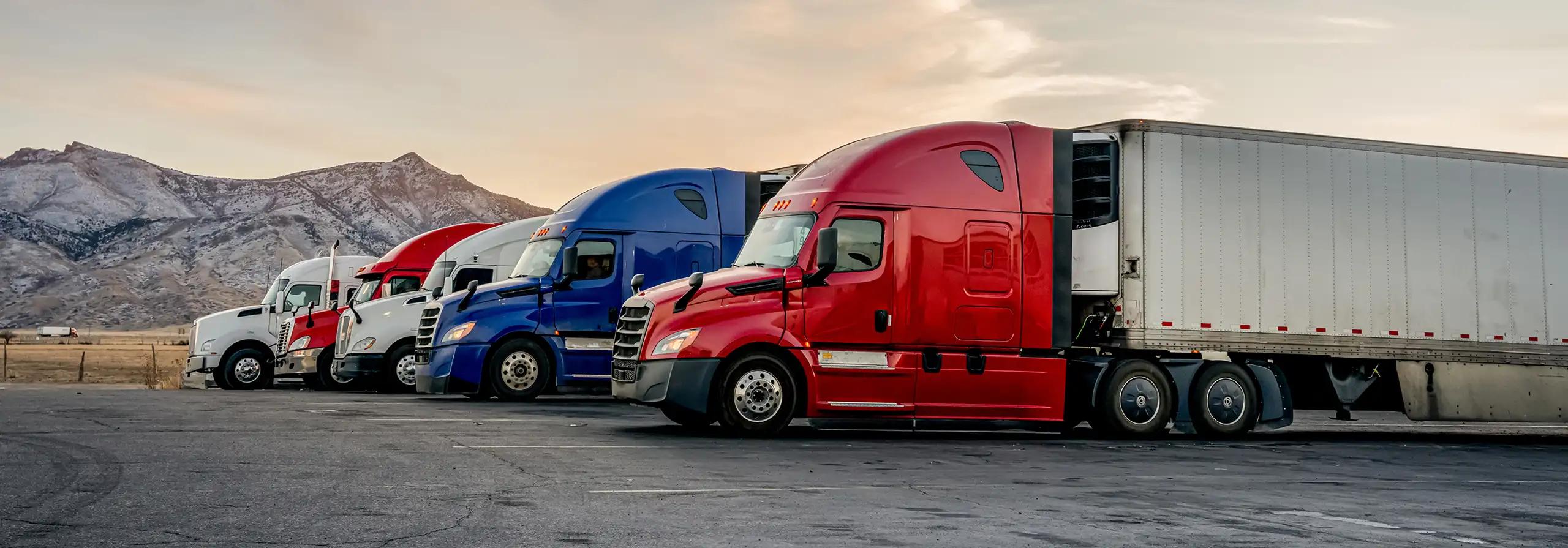 Semi trucks parked in a row