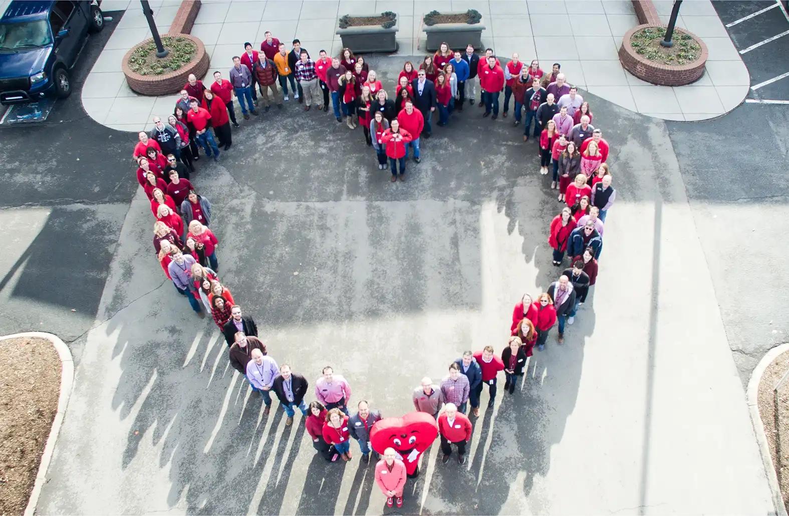 Heart shape formed by people
