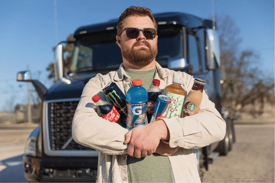 Pro driver with two arms full of drinks