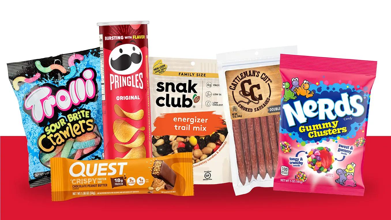 Snack line up of Trolli, Pringles, Snak Club, Cattleman's Cut, Nerds, and Quest