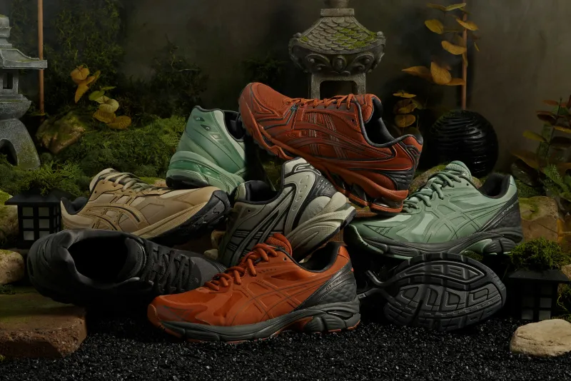 Asics shoes in a pile