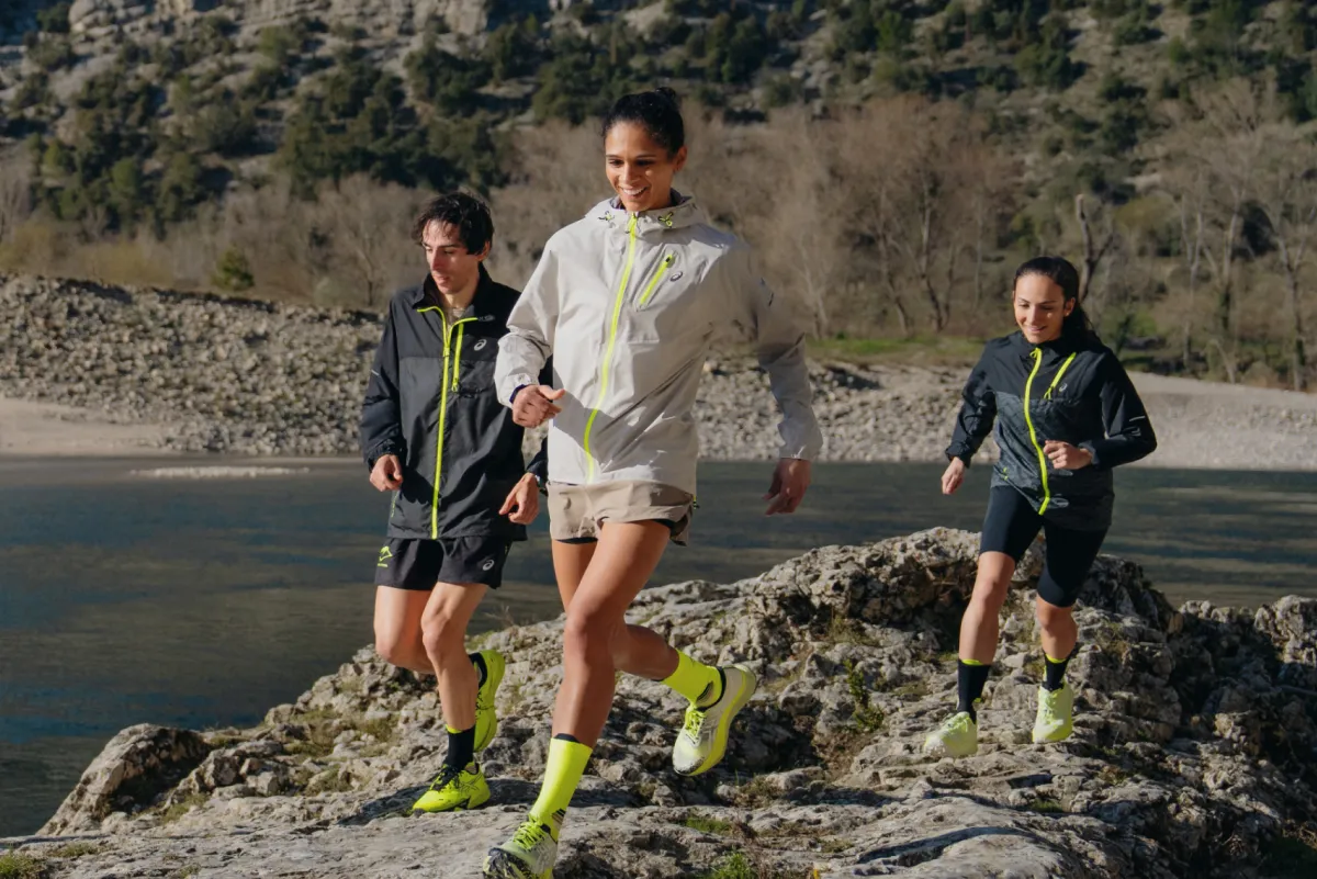 ASICS man and women running outdoors