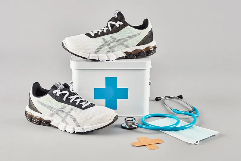 First aid kit and Asics shoes