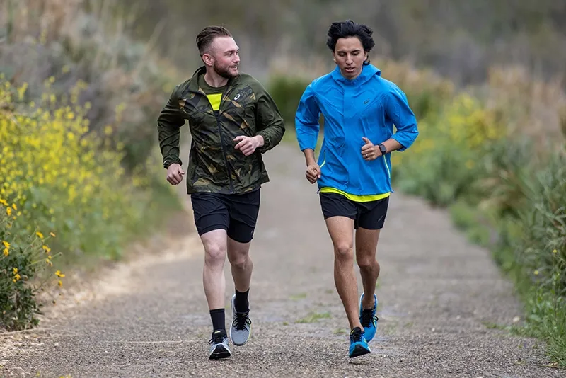 2 people running outdoors