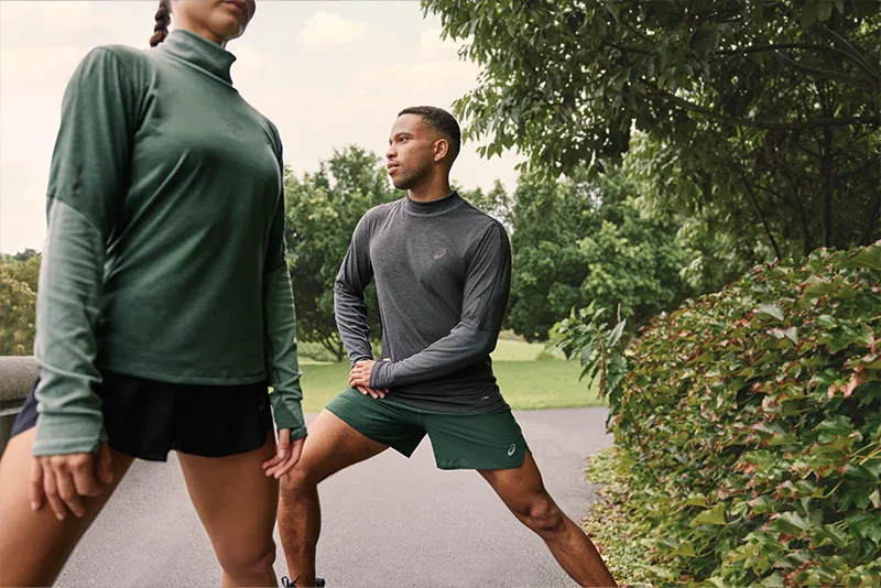 Two runners stretching