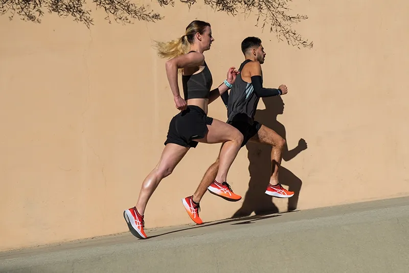 Two people running