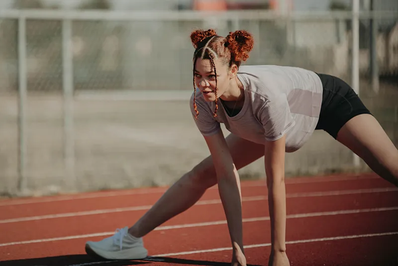Women streching at the track