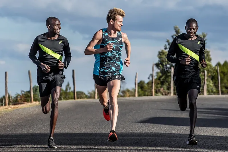 three people running